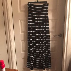 Black and white striped Maternity halter top dress.